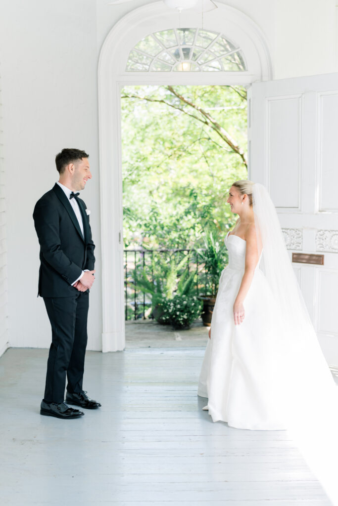 Bride and groom first look at Governor Thomas Bennett House. 