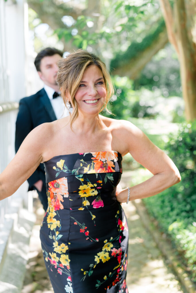 Mother of the bride black dress with pops of florals. 