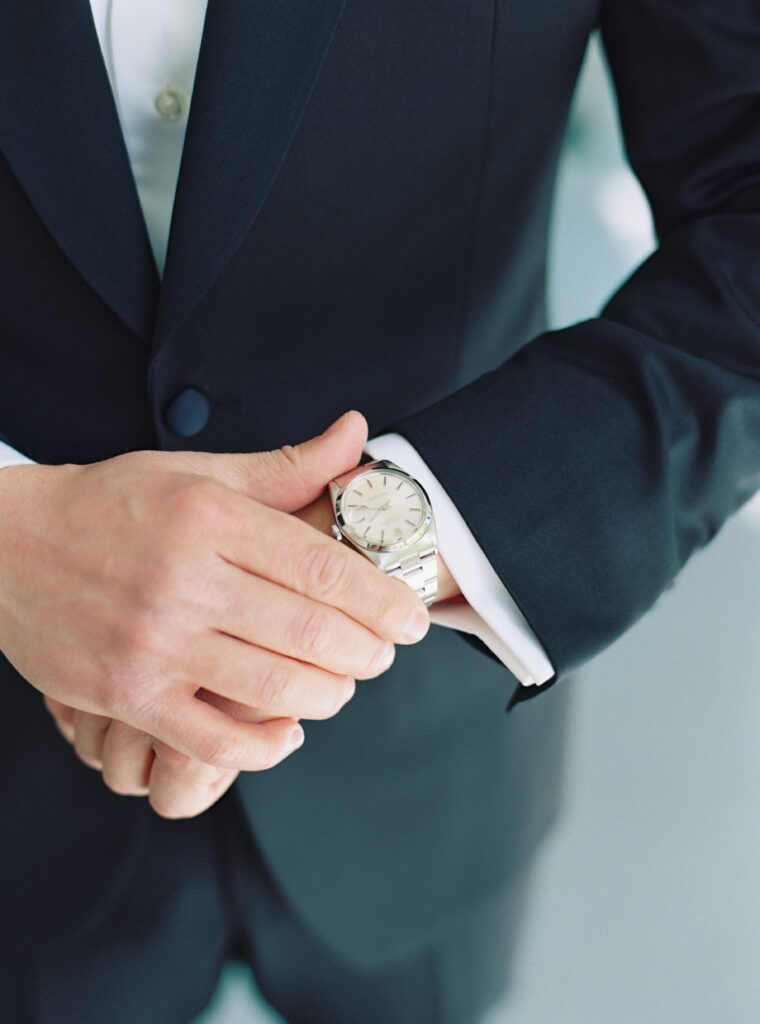 Groom wears grandfathers watch on wedding day. 