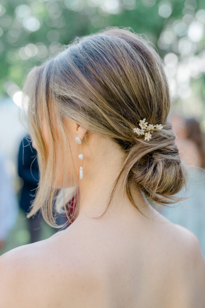 Flawless up-do hair for the bride at spring rehearsal dinner. 