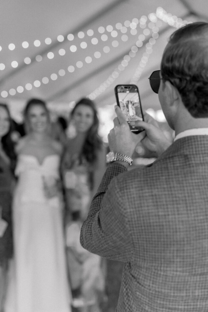 Wedding guests line up for photos. 