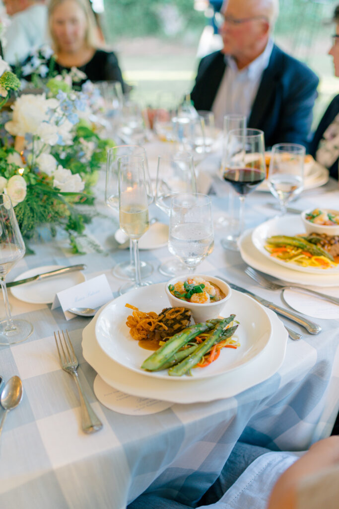 Traditional lowcountry menu at outdoor spring wedding rehearsal dinner. 