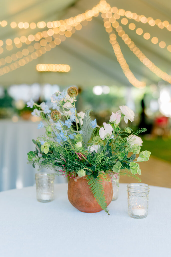 These rehearsal dinner flowers were absolutely perfect. Wedding florist gets married. 