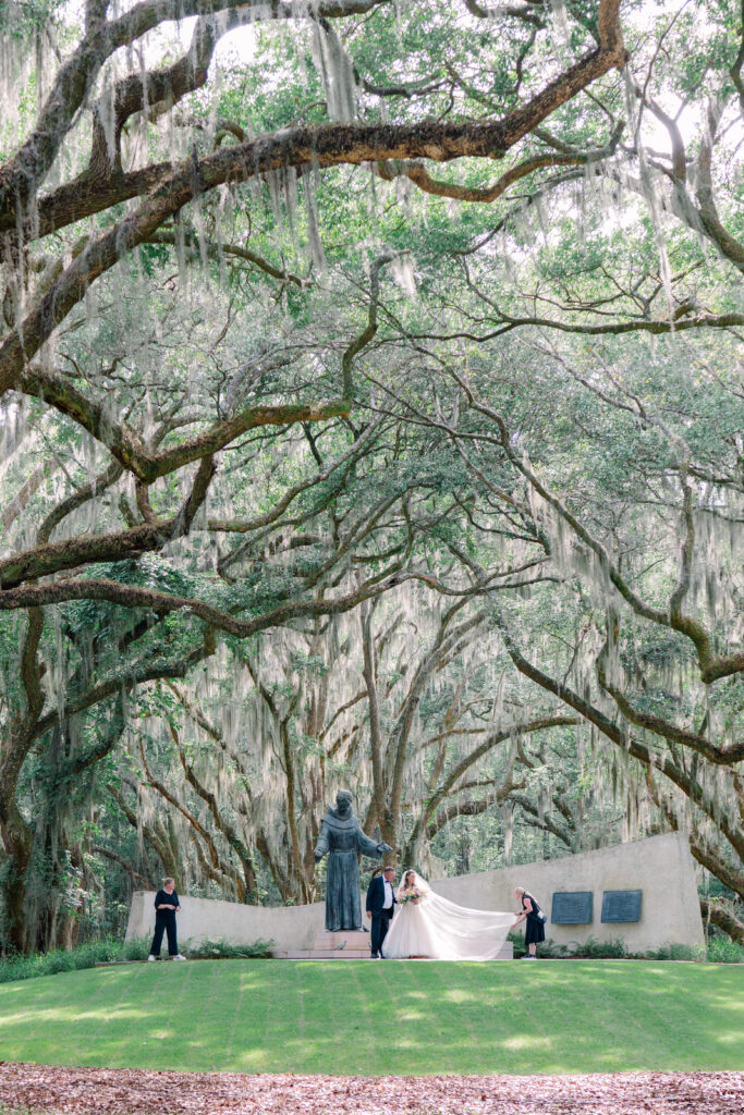 Bride and her dad in the moments before walking up the aisle at outdoor wedding ceremony. 