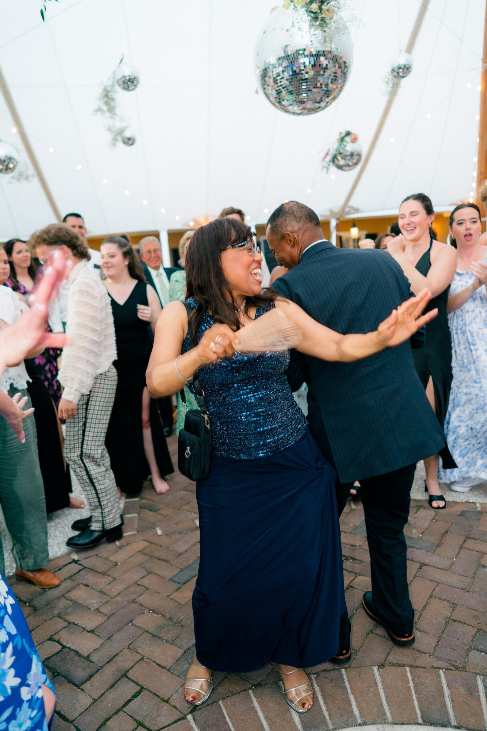 Wedding guests hit the dance floor. 