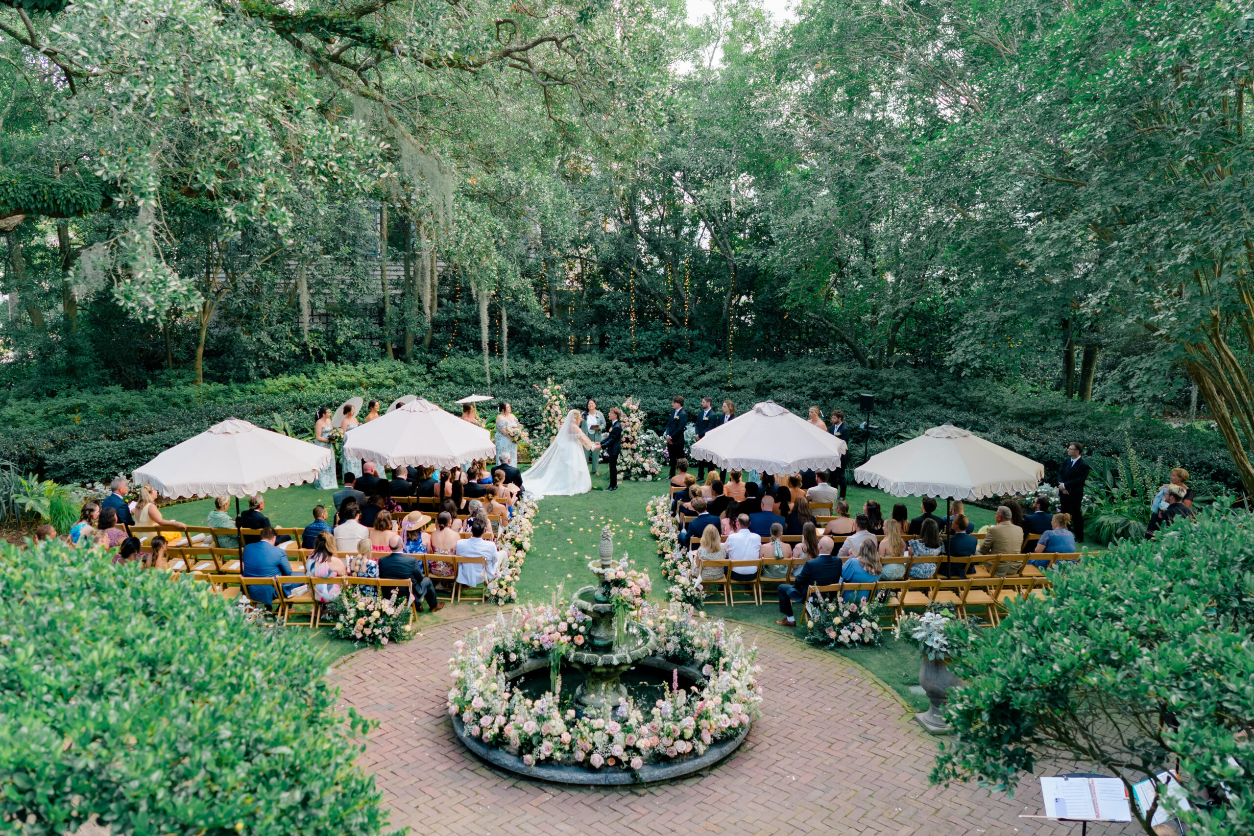 Full ceremony in the garden at Thomas Bennett House destination wedding.