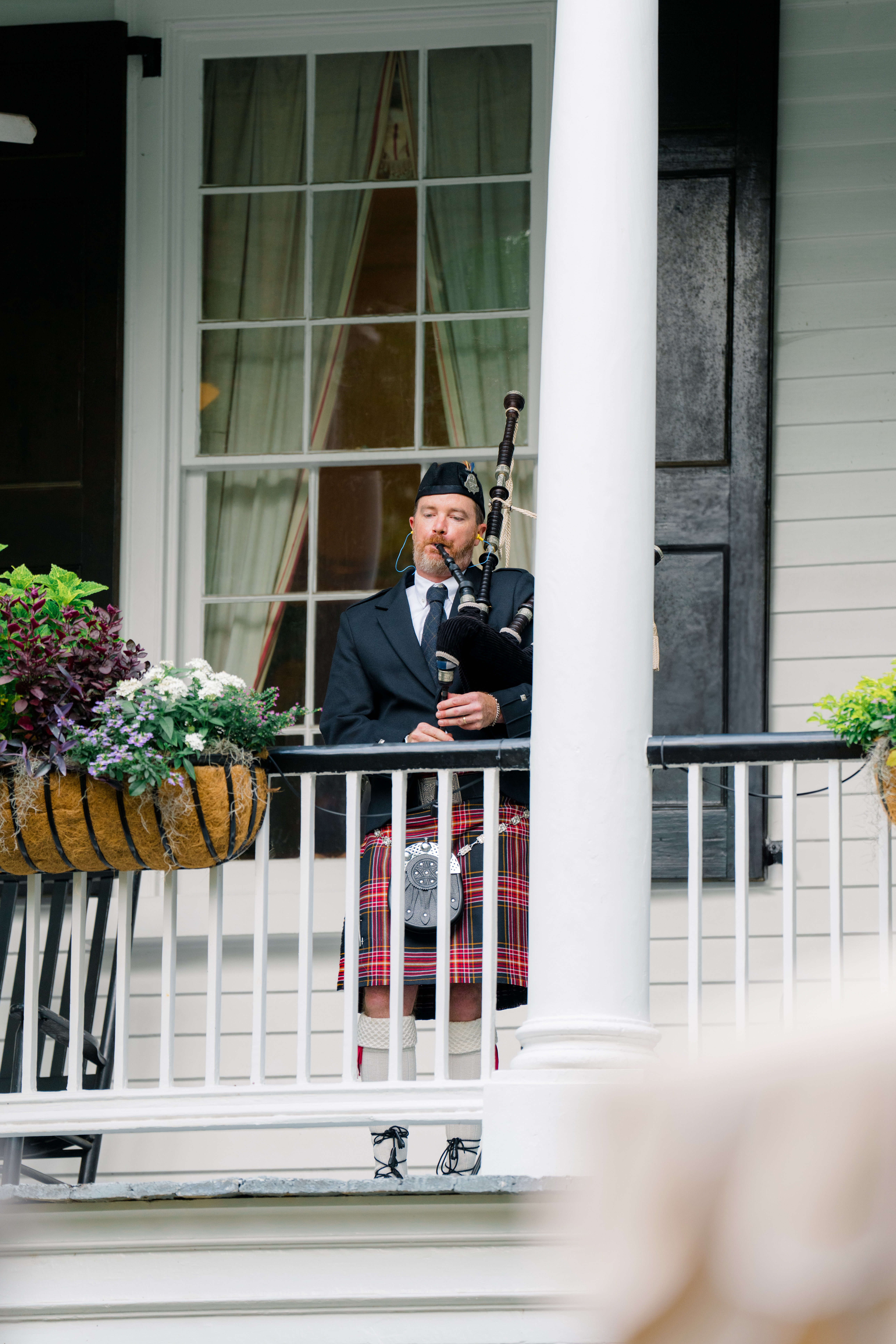 Bride and groom surprised everyone with a bagpiper. 