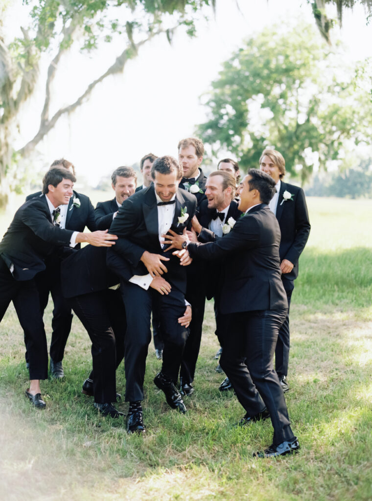 Groomsmen and groom.