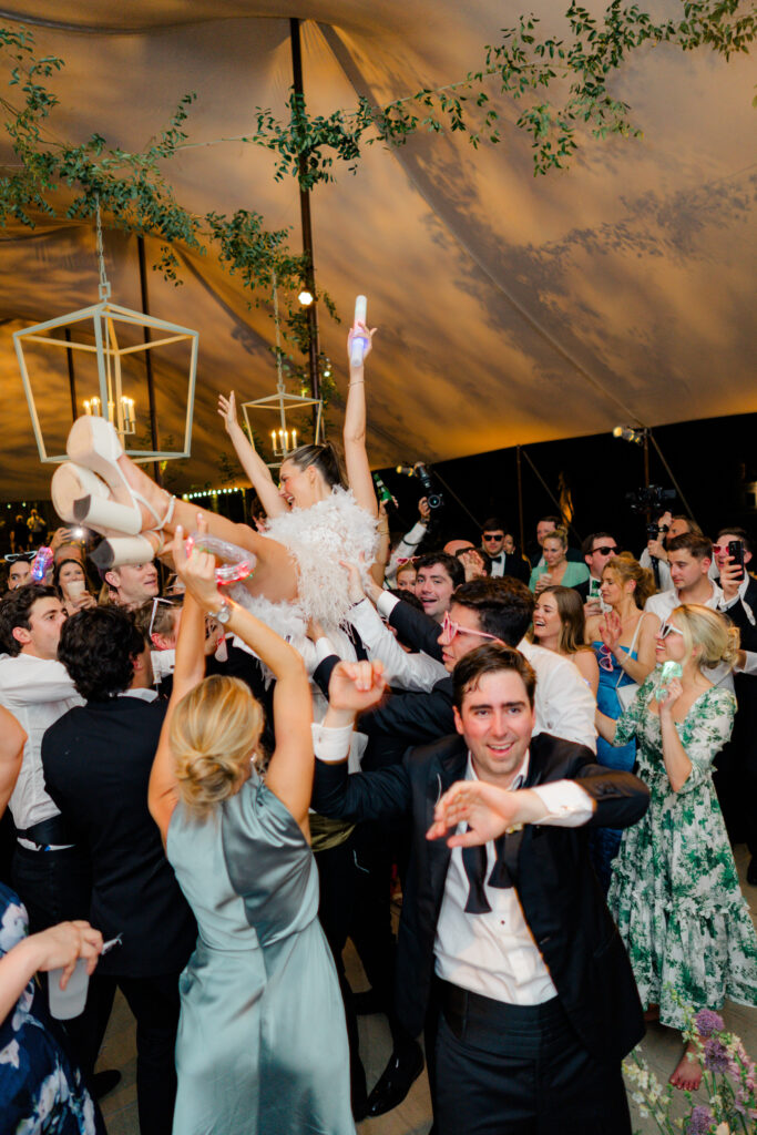 Bride in fringe second dress crowd surfing. 