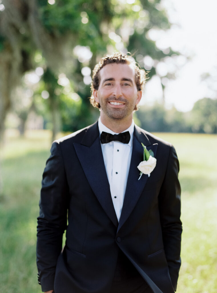 Groom in tuxedo. 