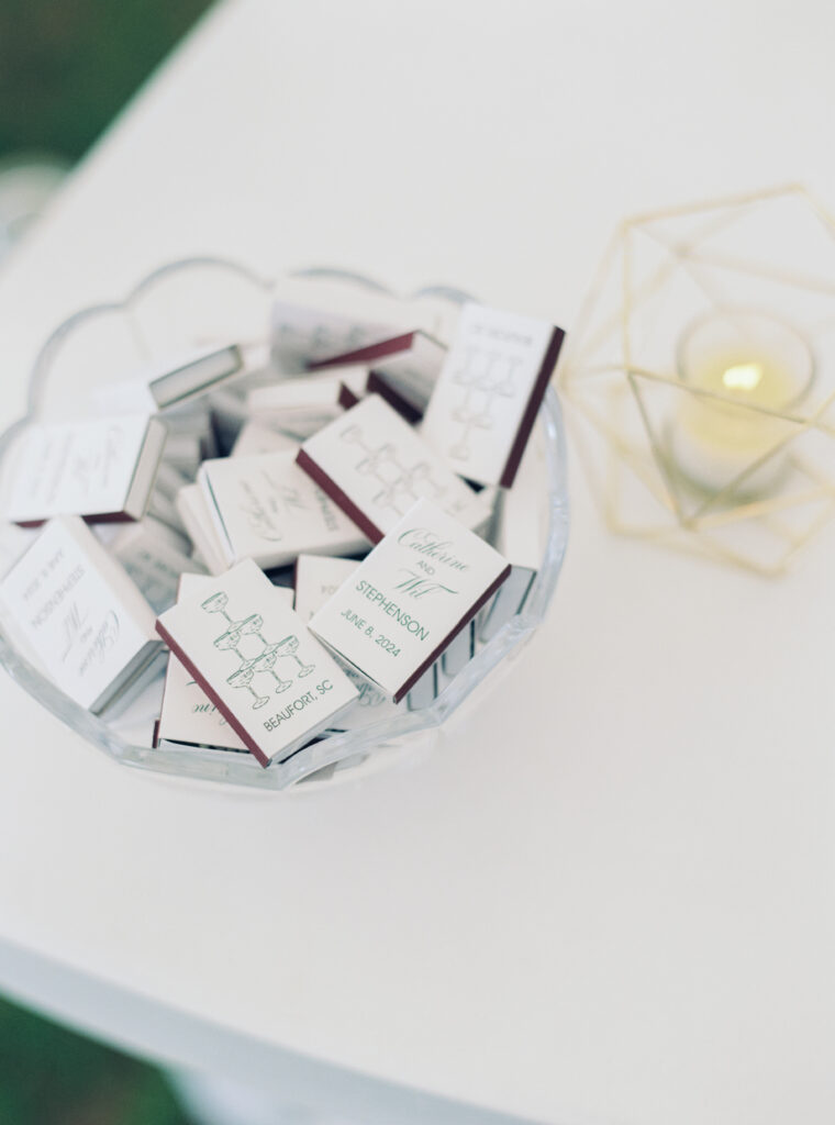 Custom wedding matchboxes with champagne tower design. 