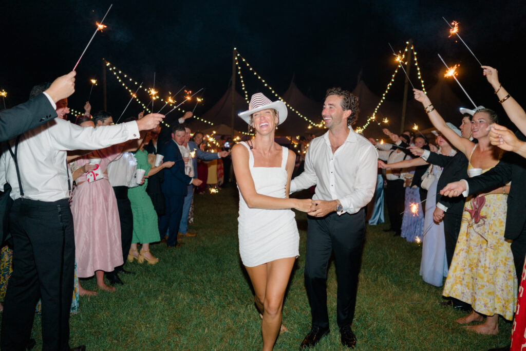 Bride and groom sparkler exit at Agapae Oaks. 