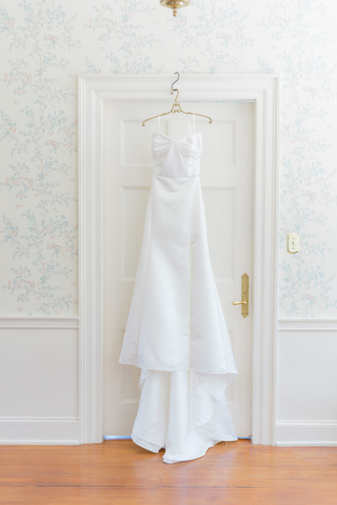 Wedding dress hanging in the house at Agapae Oaks. 