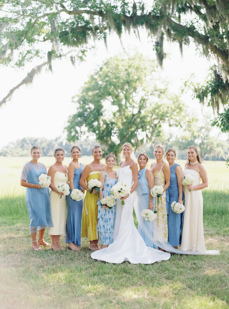 Bride and bridesmaids during perfect summer day at Agapae Oaks. 