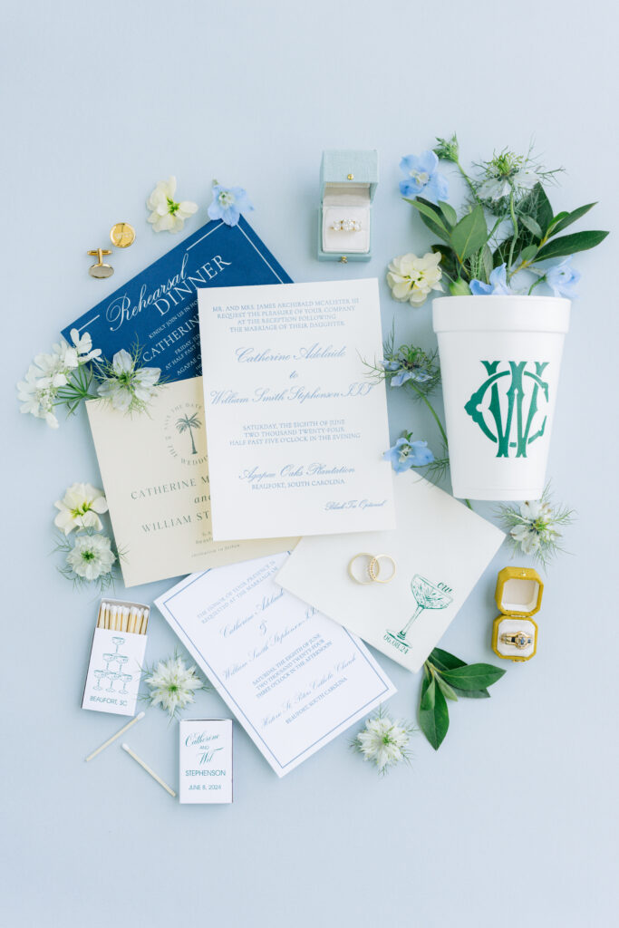 Blue and green wedding details. Wedding invitation. Custom styrofoam cup. Mustard yellow wedding ring box. 