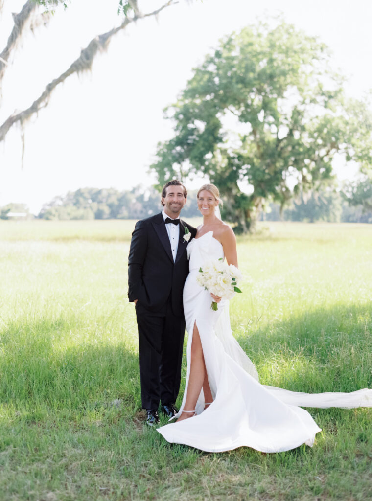 Classic wedding day portrait of bride and groom on film. 