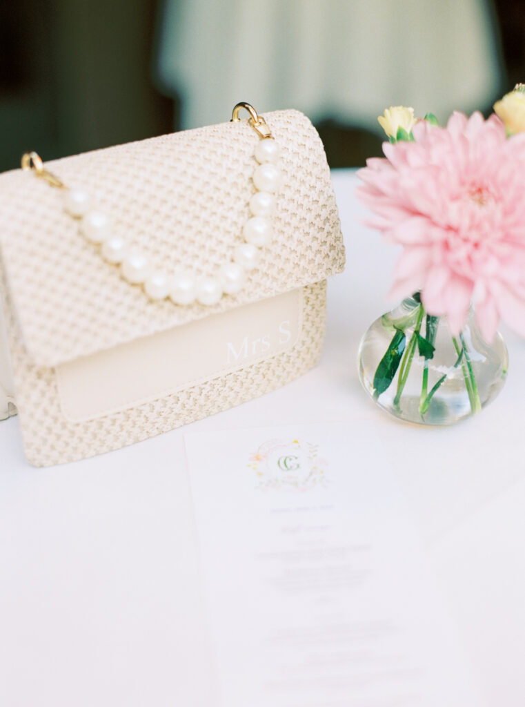 Bride's custom purse is the perfect complement. Charleston welcome party and rehearsal dinner. 