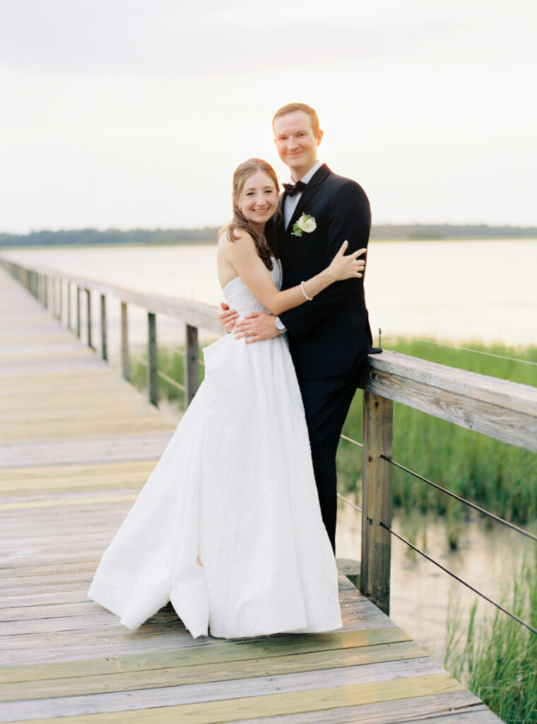 Bride and groom formal portrait during sunset. 