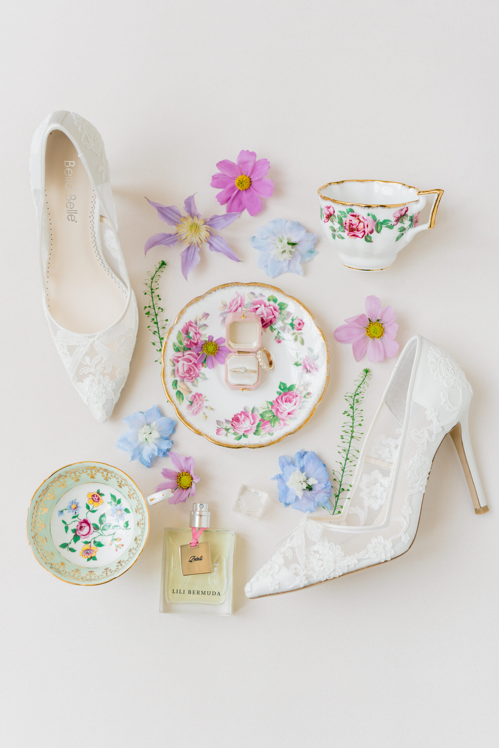 Bridal details featuring family heirloom tea cups. 