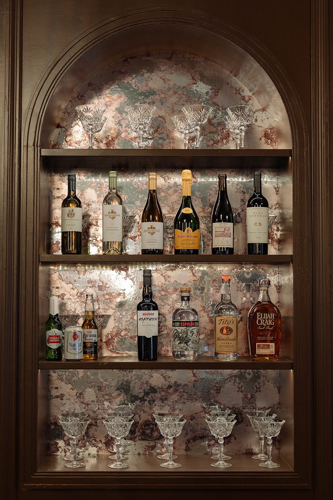 Distressed mirror detail on the bar.