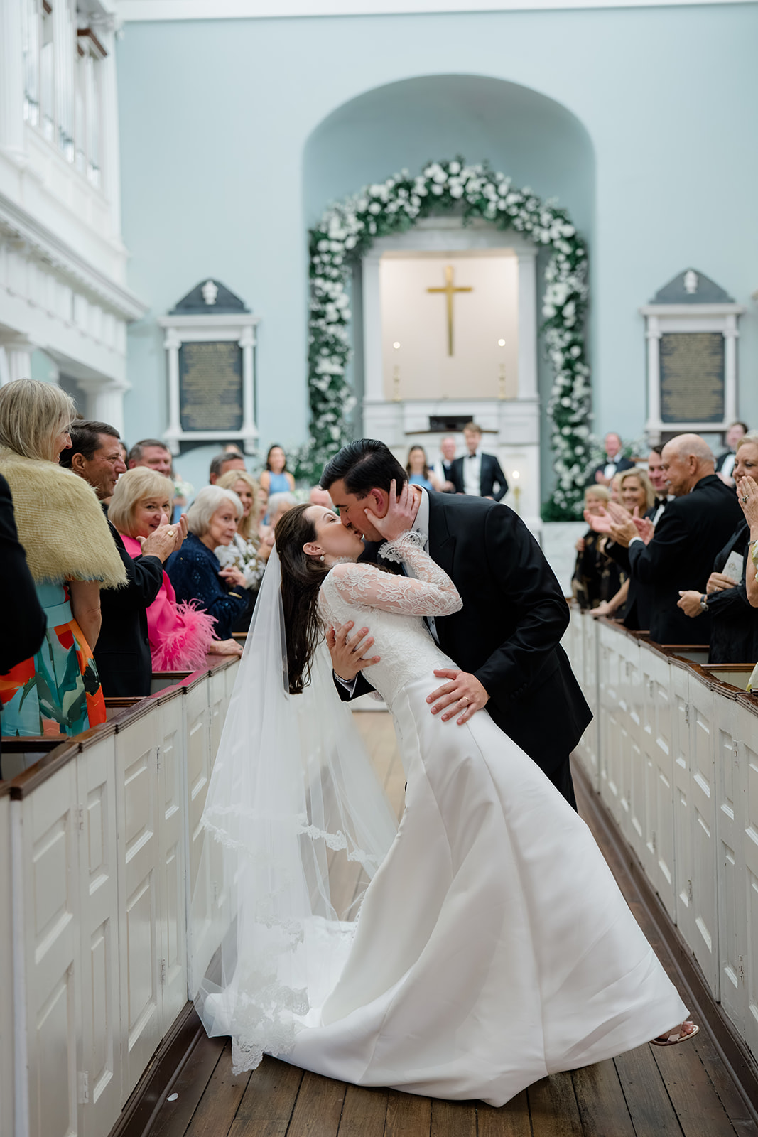 Church wedding ceremony aisle dip kiss