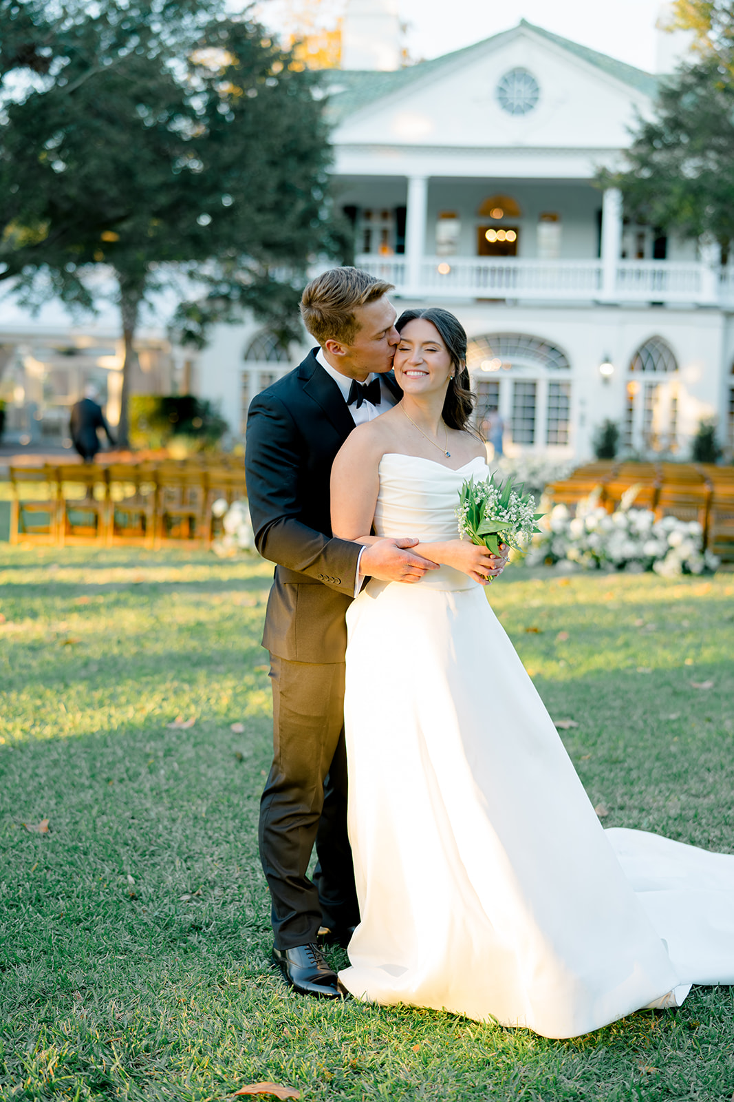 Bride and groom newlywed portraits at golden hour. Lowndes Grove wedding. 