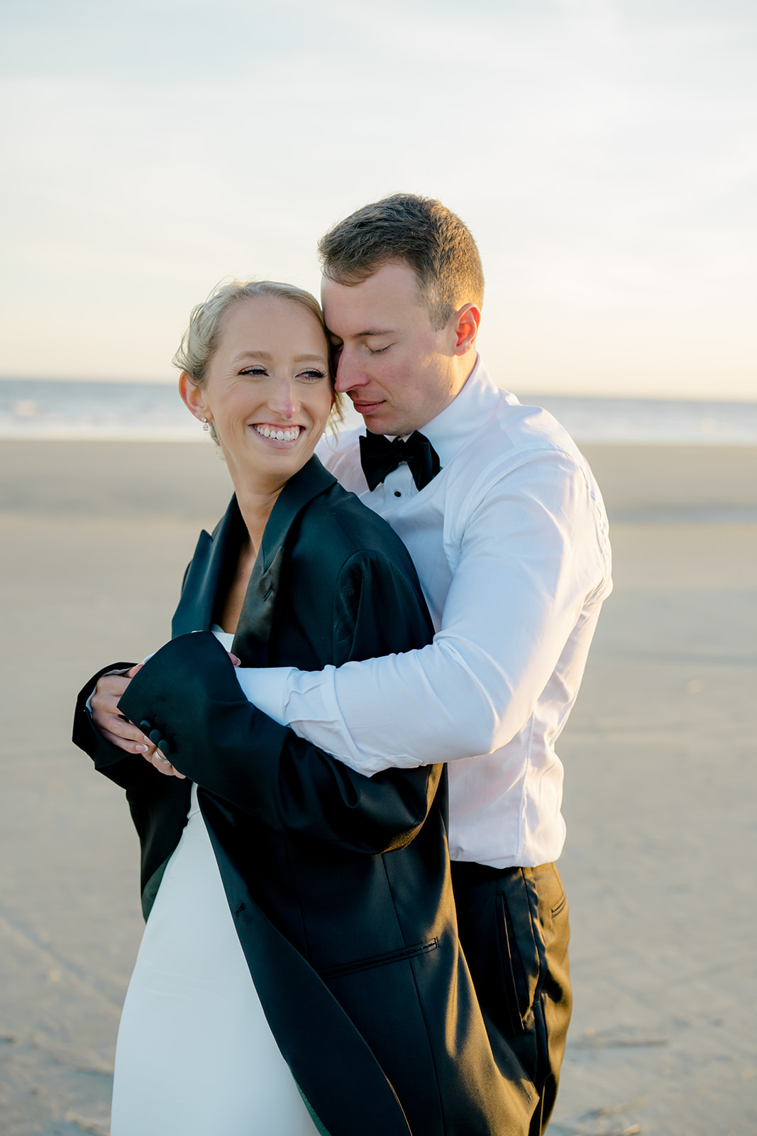 Chilly newlywed photos on the beach at kiawah island. 