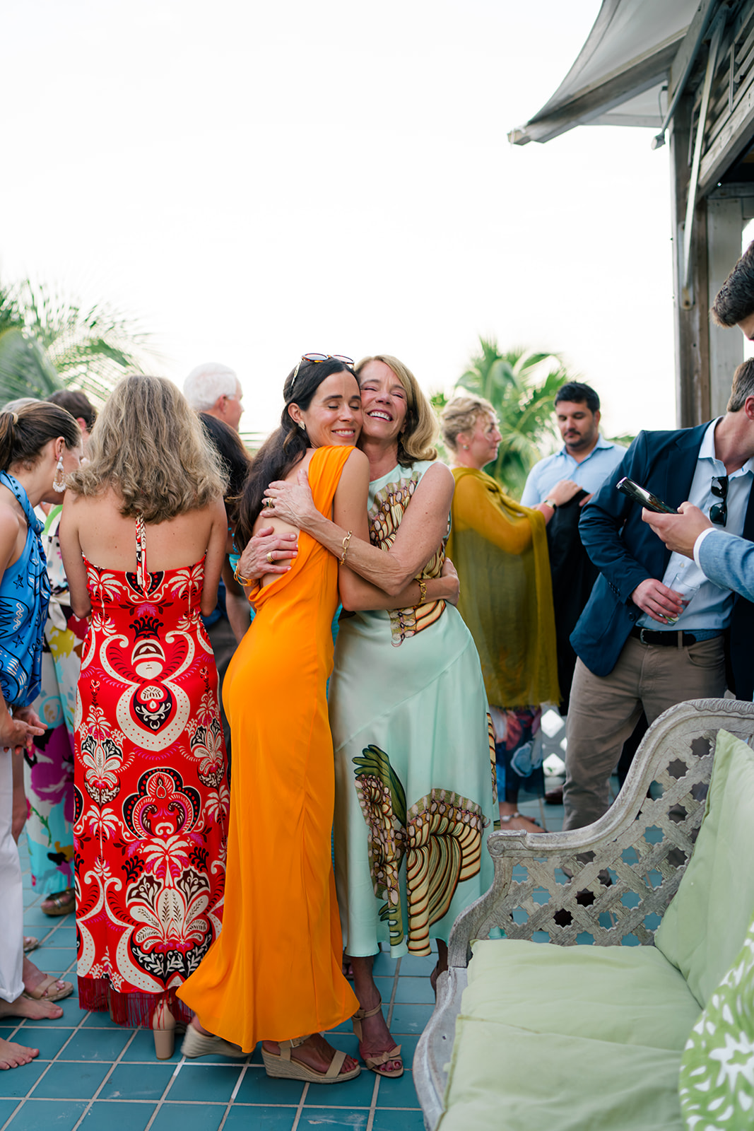 two people hugging and smiles. 