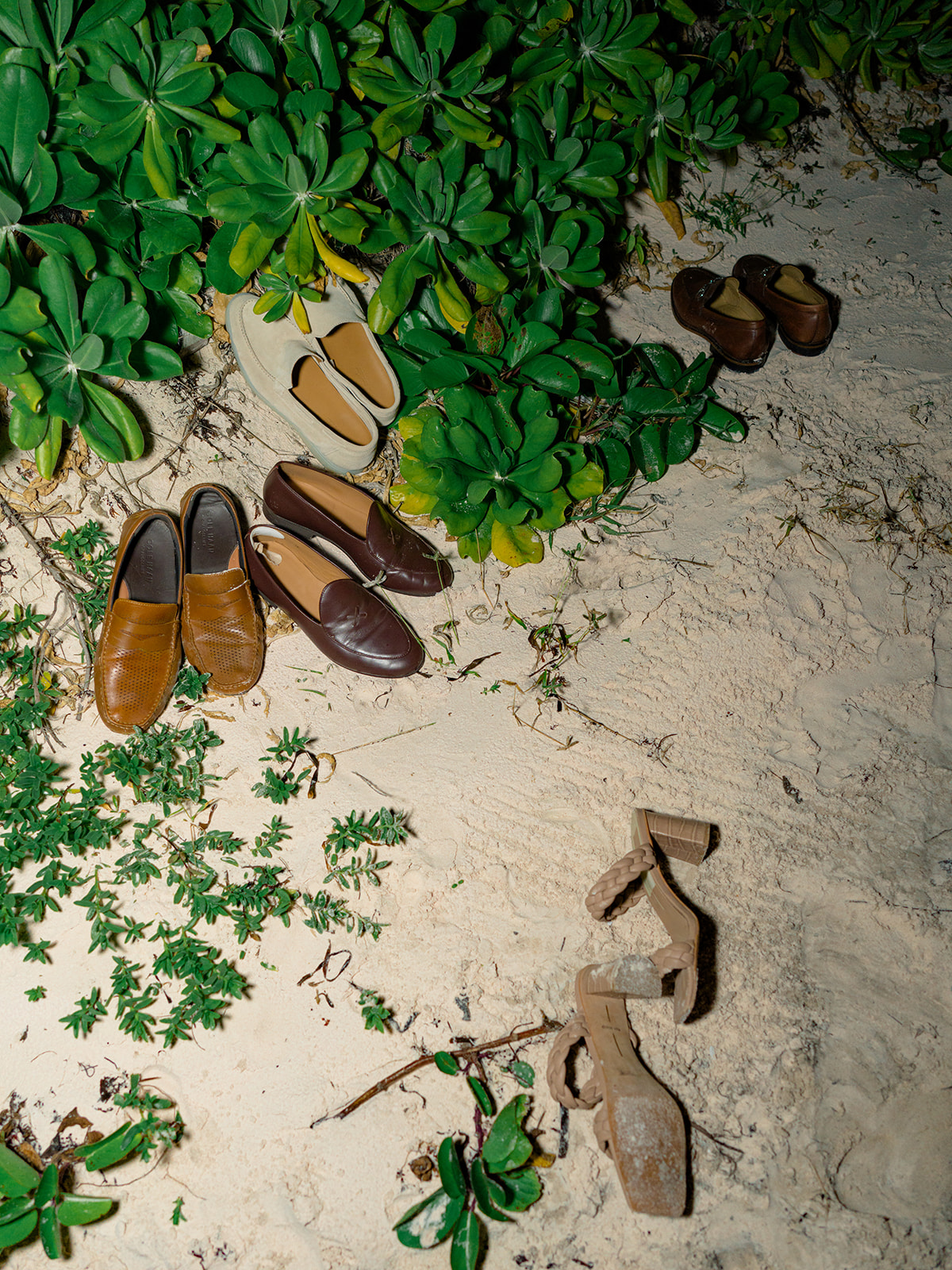 everyone ditched their shoes for this beach front wedding welcome party in harbour island bahamas. 