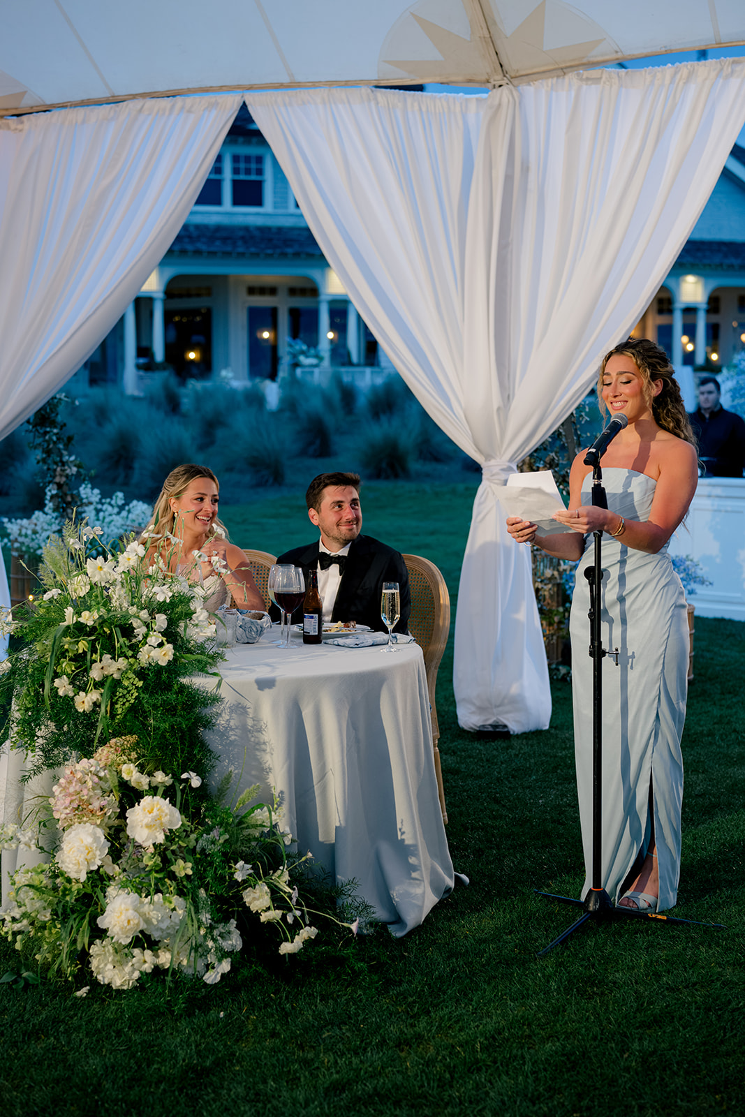Maid of honor speech. Maid of honor in light blue dress. 
