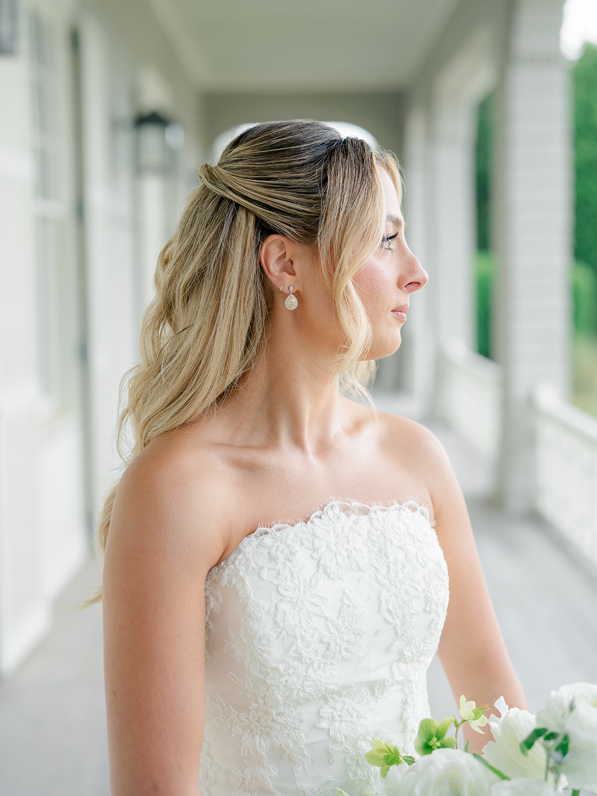 close up of brides earrings