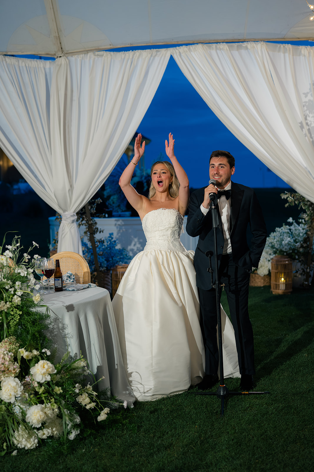 Bride and groom say thank you to wedding guests. 