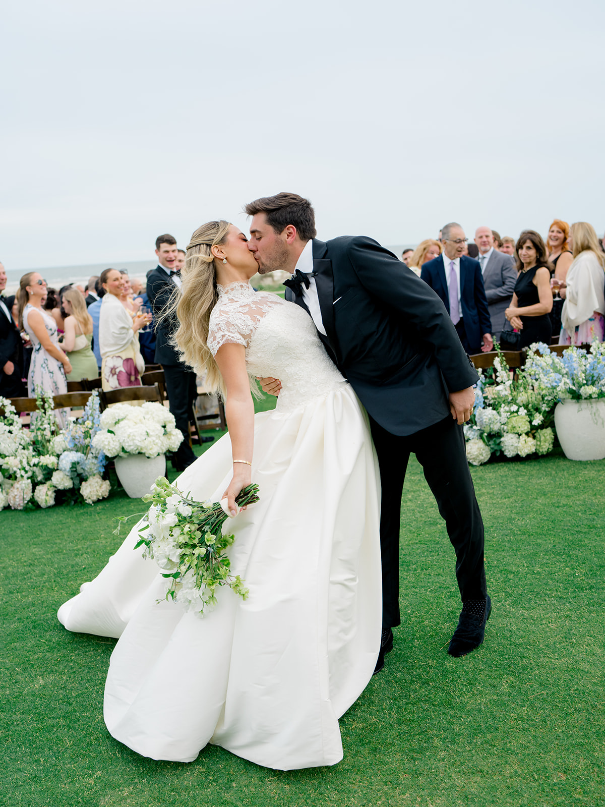Ceremony aisle dip kiss. 