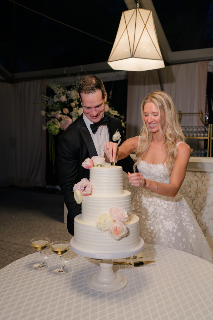 Bride and groom cake cutting 