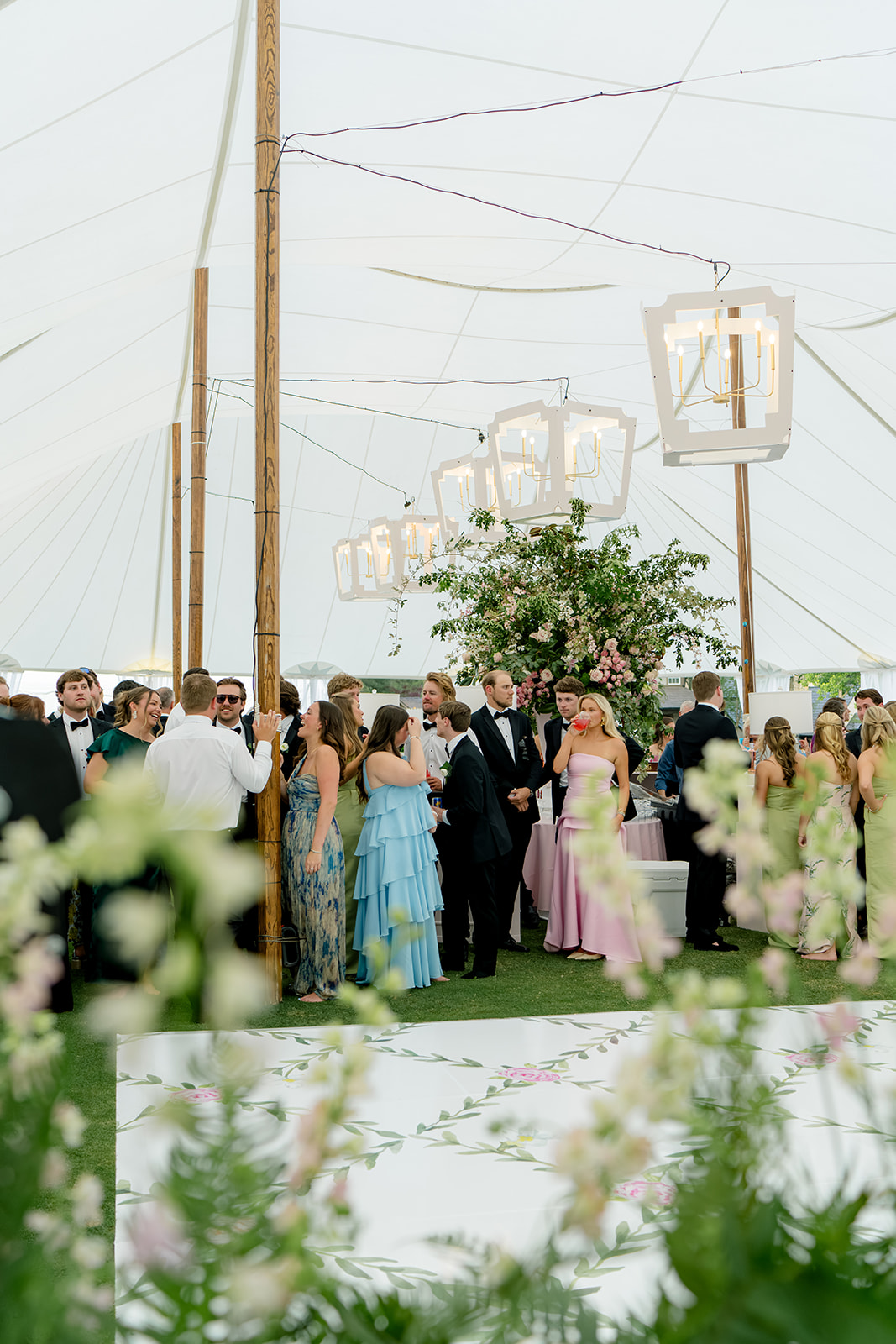 Wedding guests wait for the bride and groom at spring wedding at lake keowee.