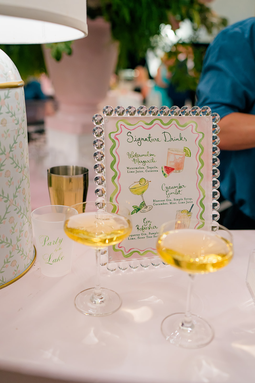Pink and green signature drink menu. Wedding reception. 