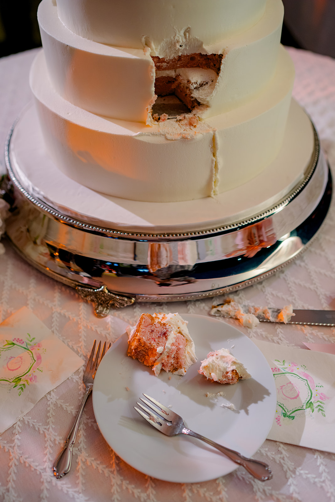 Bride and groom wedding cake cut.